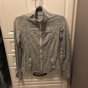 Grey/ white Lululemon zip up, size 8. Like new.